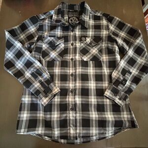 Woman’s Pennywise Dixxon flannel Size Large